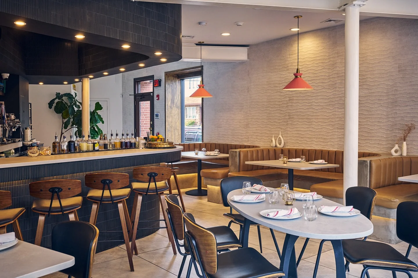 The dining room at Five Corners Ristorante, featuring a full bar and a modern dining room