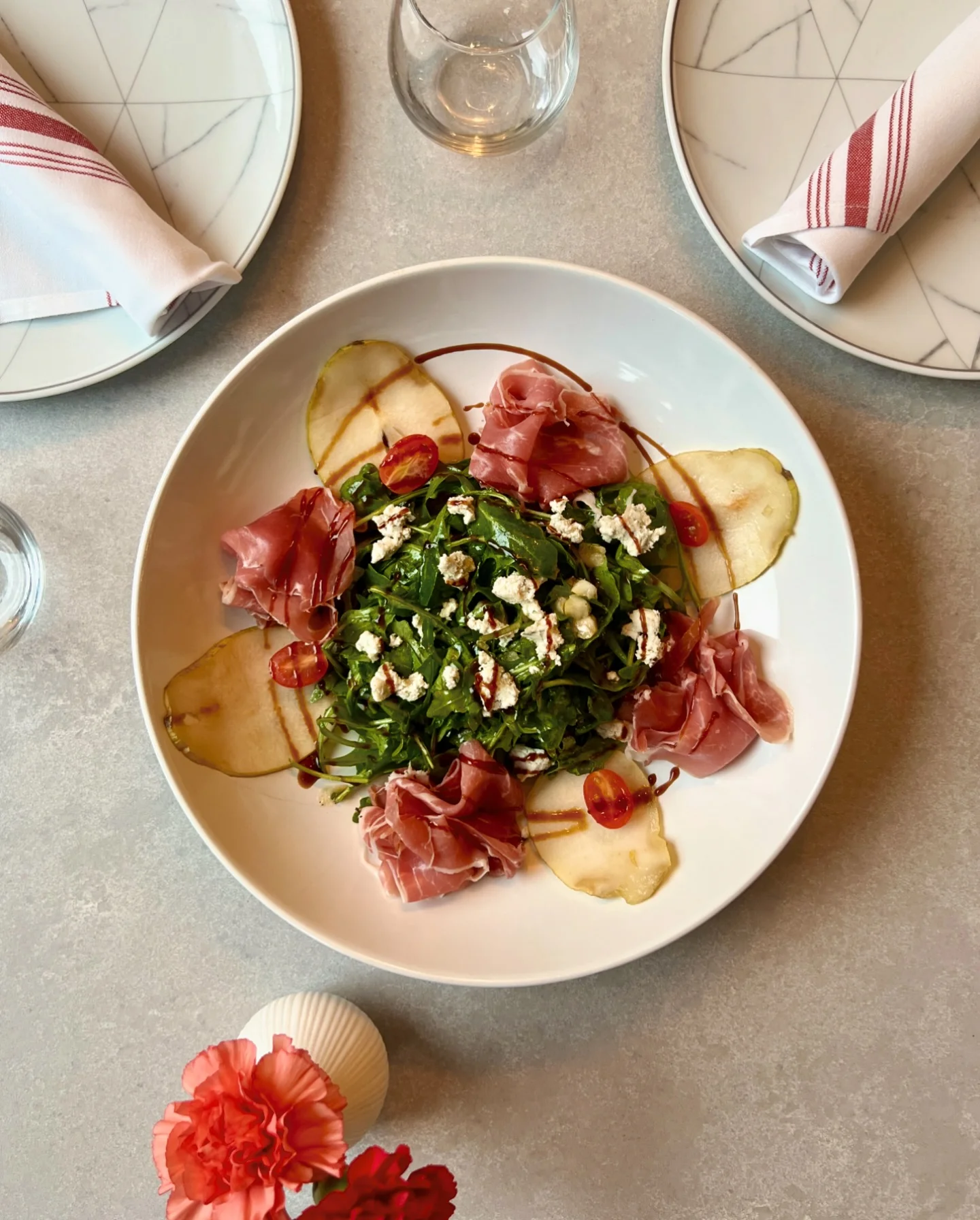 Pear and prosciutto salad appetizer with bleu cheese and arugula at Five Corners Ristorante